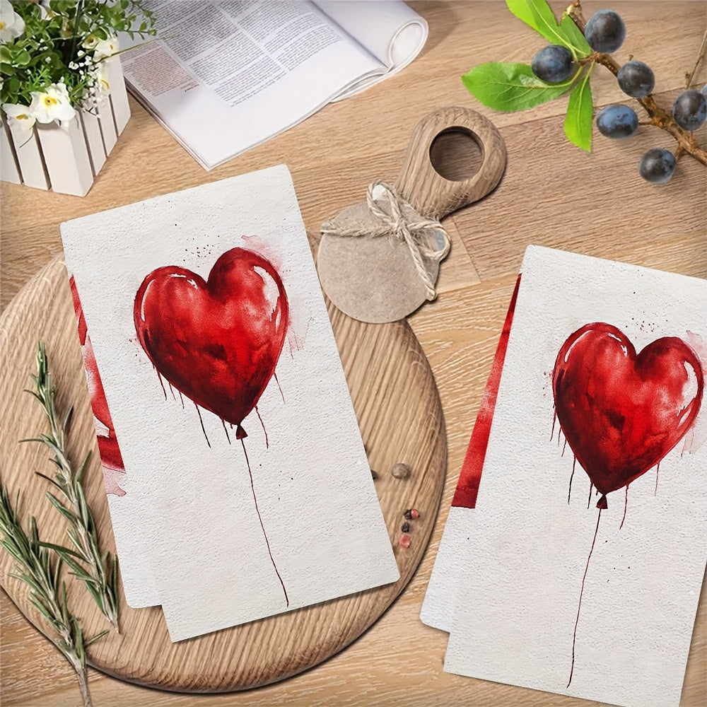 Two pieces of ultra soft kitchen towels featuring a Valentine's Day heart balloon design. These towels are highly absorbent and machine washable, making them perfect for dish and hand drying. With a contemporary style and measuring 40.64x60.96 cm, these