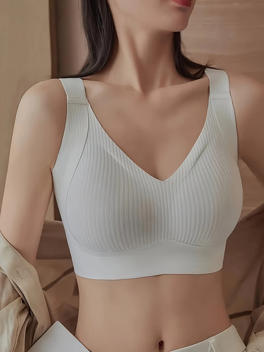 Elegant solid color bralette with soft support and medium support, made of comfortable knit fabric with wide straps.