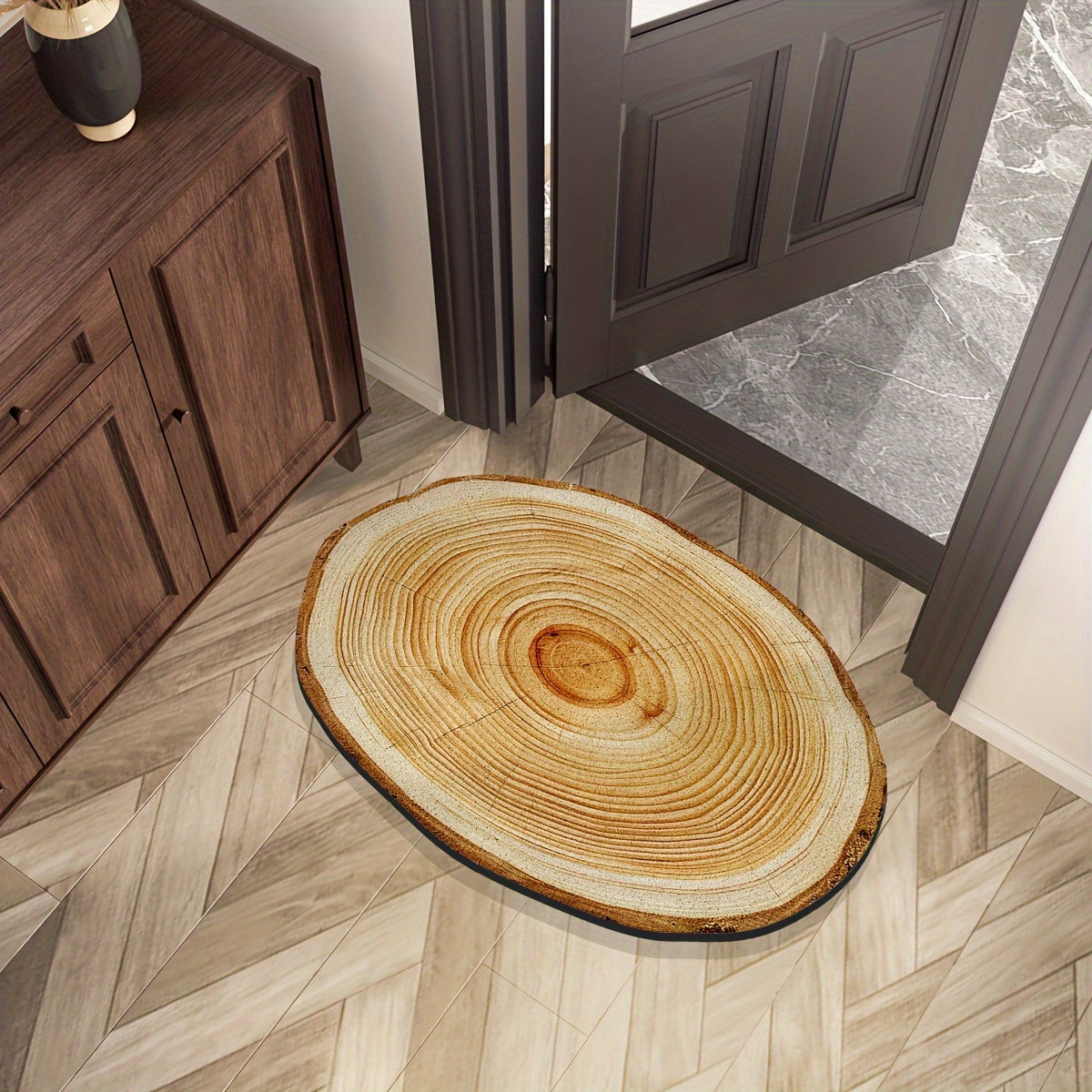 Wood Grain Tree Ring Design Indoor Doormat featuring a non-slip rubber backing for added safety. This decorative floor mat is made from machine-made polyester and is hand-washable. The low pile entry rug is flame resistant, making it perfect for use in