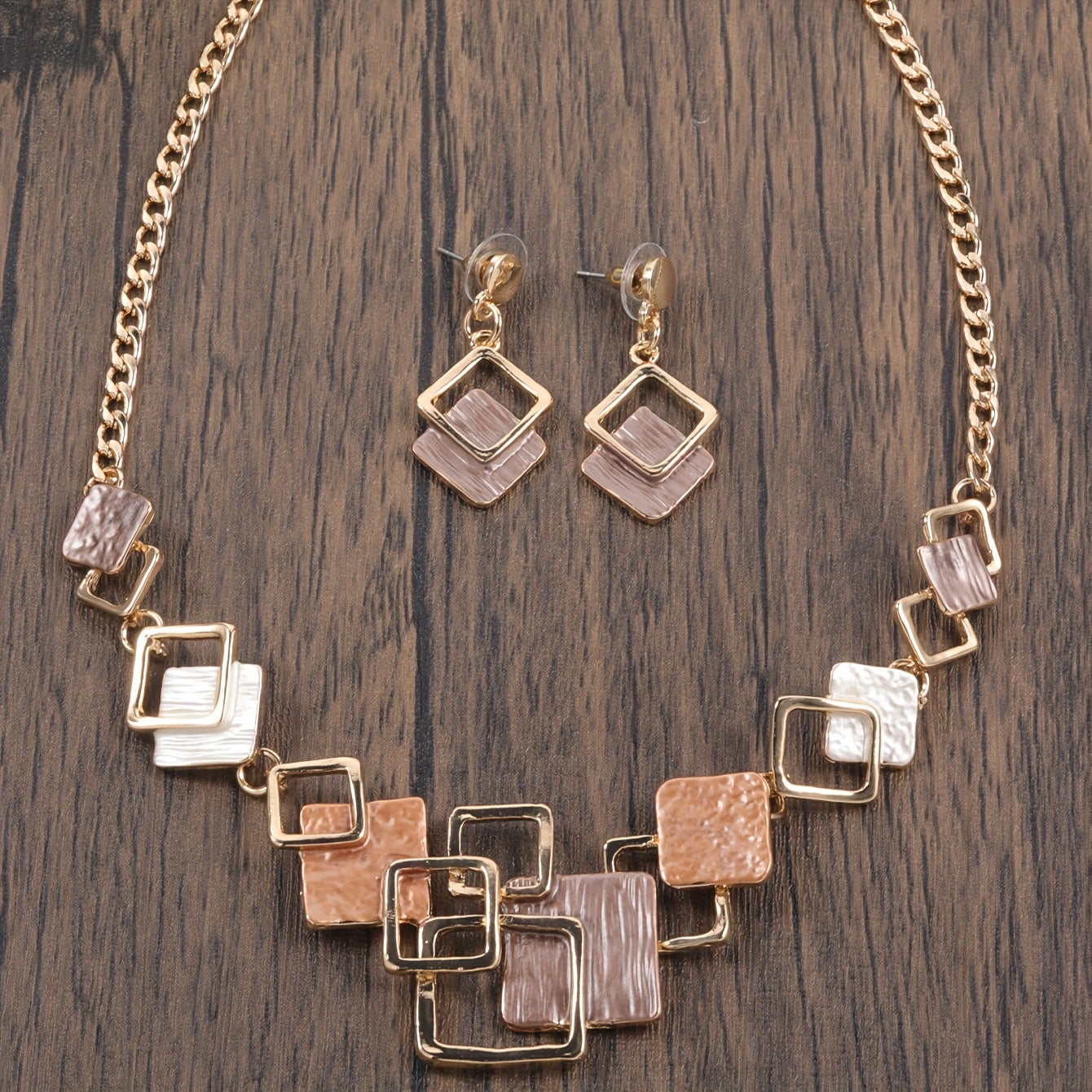 One trendy geometric design jewelry set includes one pair of earrings and one necklace in boho style, perfect to match with daily outfits or as a party accessory. Made from enamel, this set is a must-have addition to your jewelry collection.