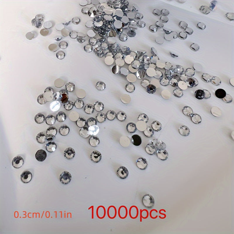 10,000 pieces of Crystal AB Flatback Rhinestones available for Nail Art, DIY Crafts, and Jewelry Making. These Non-Hotfix Resin Gems are perfect for adding a touch of sparkle to your projects.