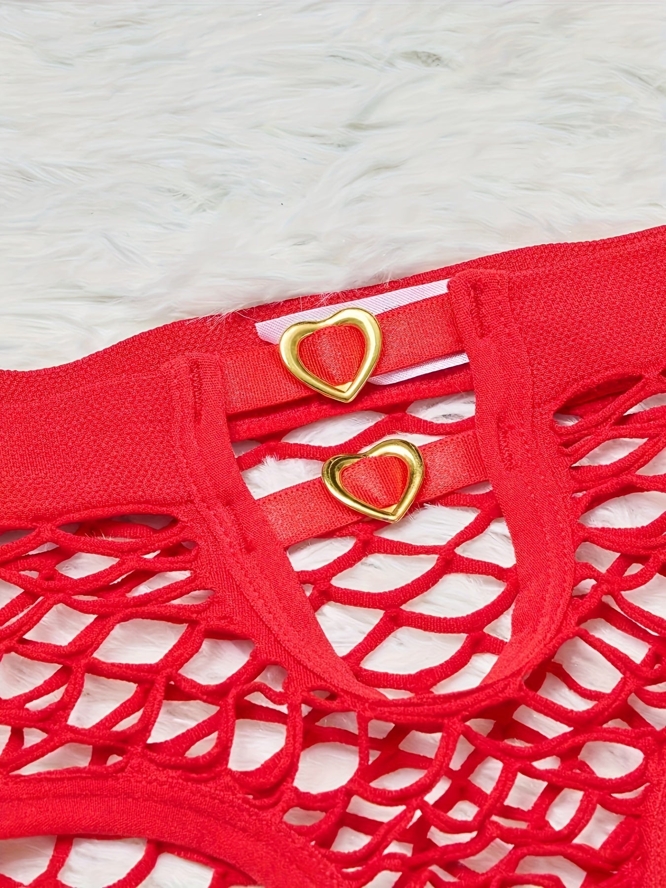 Heart-shaped mesh brief with hollow-out design, low waist panties for women's lingerie.