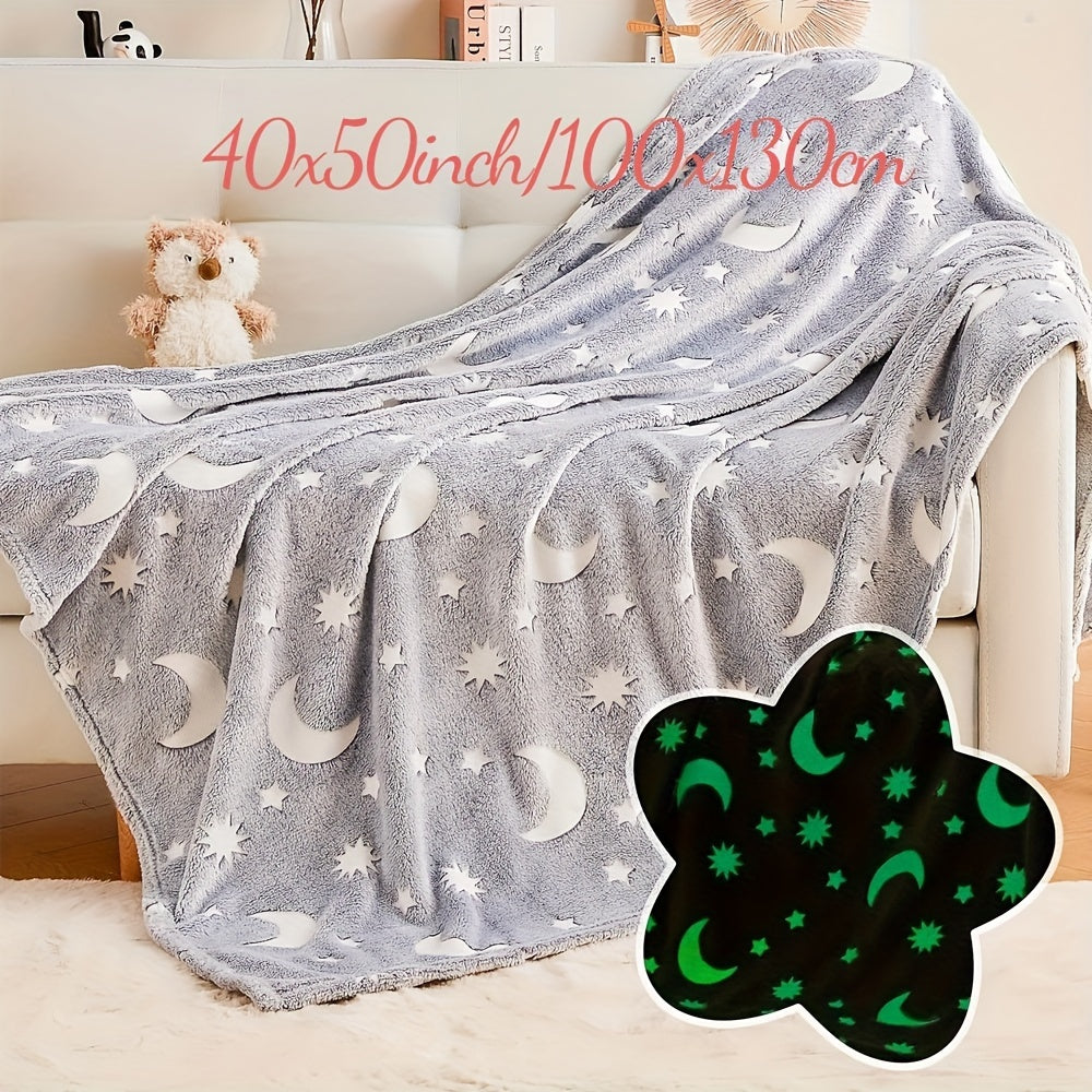 Soft, durable, and hypoallergenic, this cozy throw blanket features glow-in-the-dark stars and moons. Perfect for all seasons, it is ideal for adding a touch of comfort to your bedroom, living room, or when traveling.