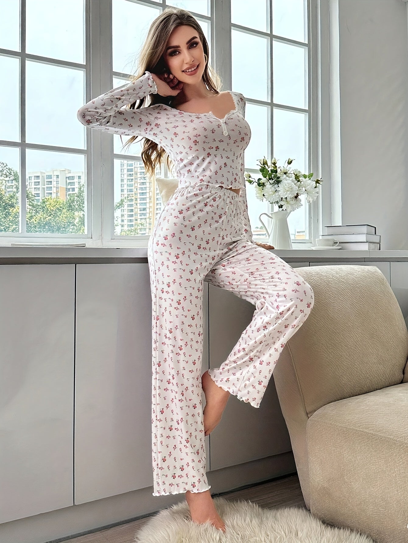 Floral ruffle pajama set for women in cozy polyester knit fabric, perfect for fall/winter lounging.