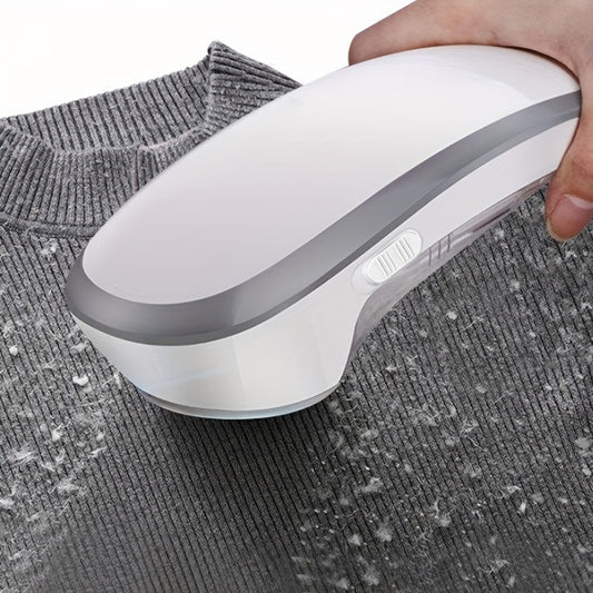 USB charged fabric shaver and lint remover for removing fuzz and pills from clothes, furniture, sweaters, couches, and blankets.