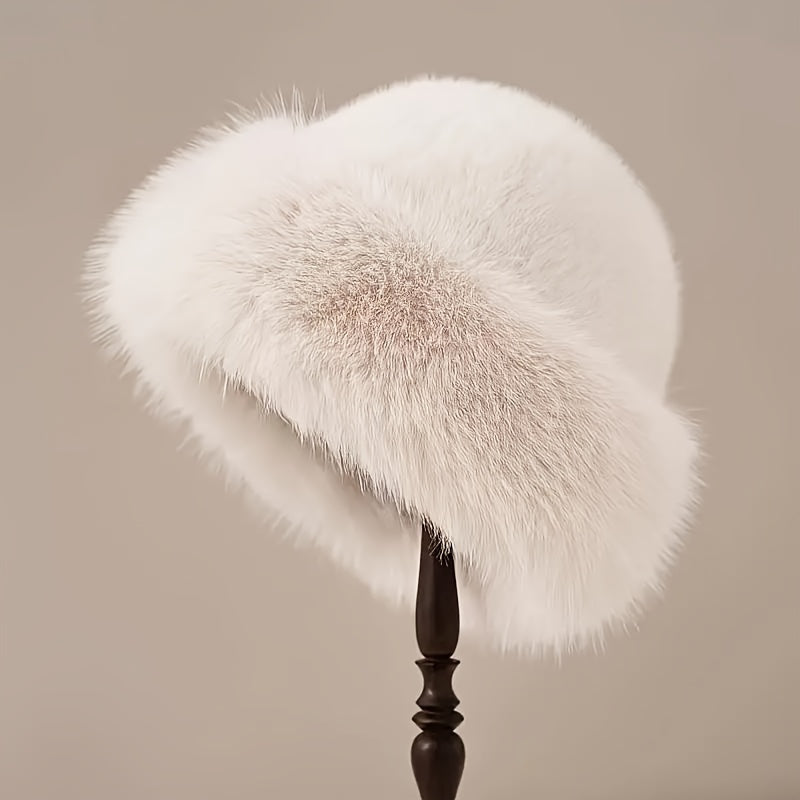 Luxurious LuxeFur Women's Faux Fur Winter Hat. Made of polyester fiber, this hat is lightweight and machine washable, making it a practical urban style accessory.