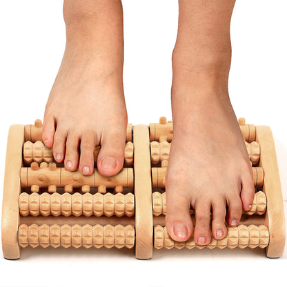 Wooden foot massager roller for pain relief and fatigue reduction.