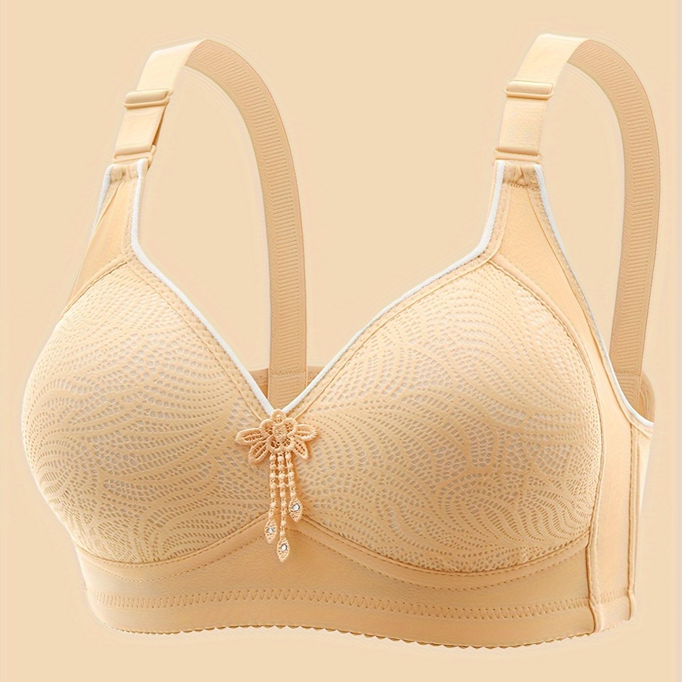 Solid seamless wireless tank bra with tassel decoration, providing sexy comfort and push-up support for women's lingerie.