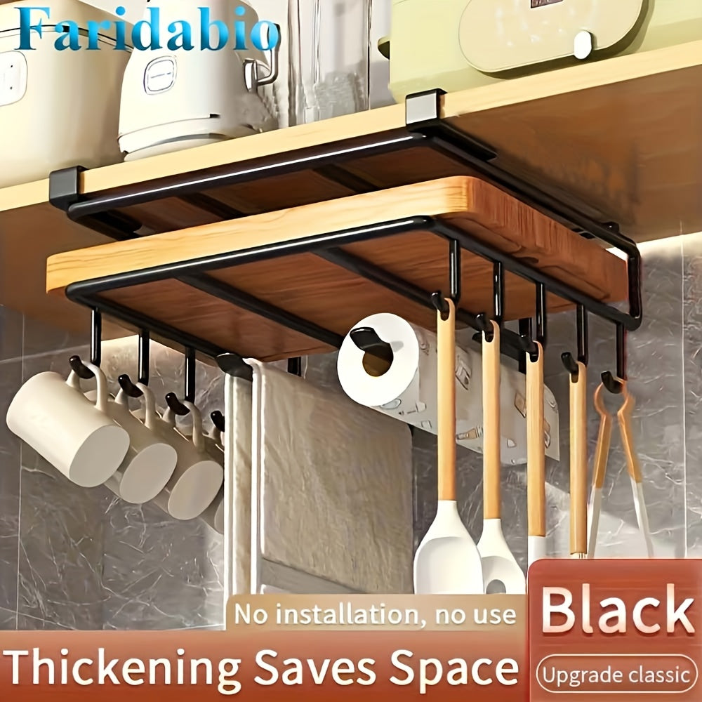 Stainless steel cabinet organizer with hanging rack for cutting board and kitchen essentials.