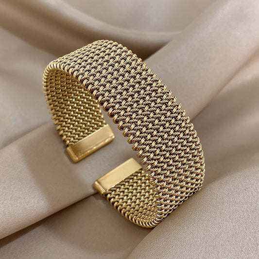 Vintage braided mesh metal cuff bracelet made of stainless steel, a classic and waterproof wrist accessory for daily wear and parties, suitable for both women and men. A perfect jewelry gift option.