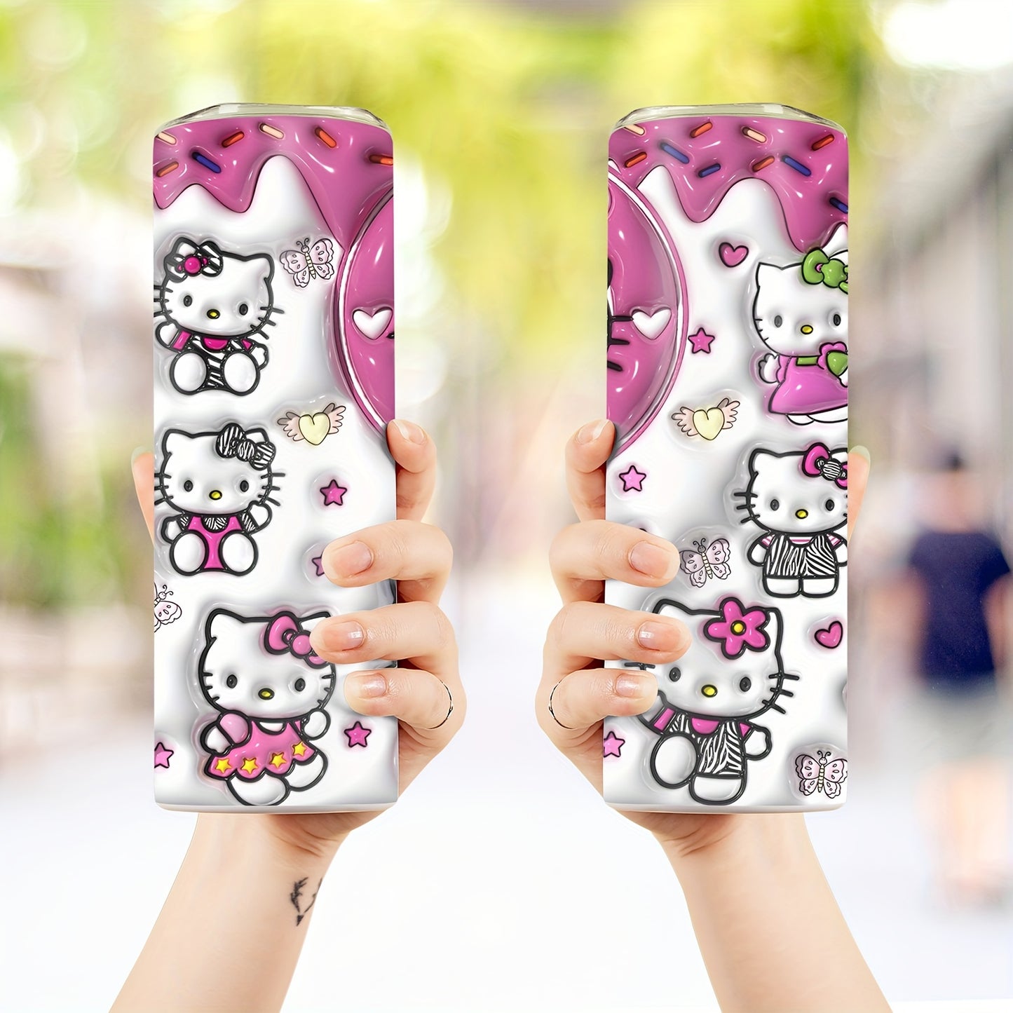 A 20oz stainless steel water bottle with a cute Hello Kitty design, suitable for various beverages.