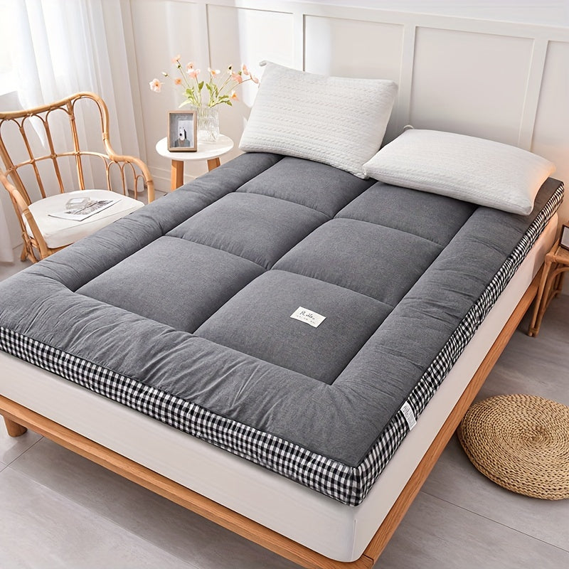 Soft and luxurious plaid mattress topper, perfect for all-season comfort in your bedroom, guest room, or dorm. Breathable and fluffy for a cozy autumn and winter sleep essential.