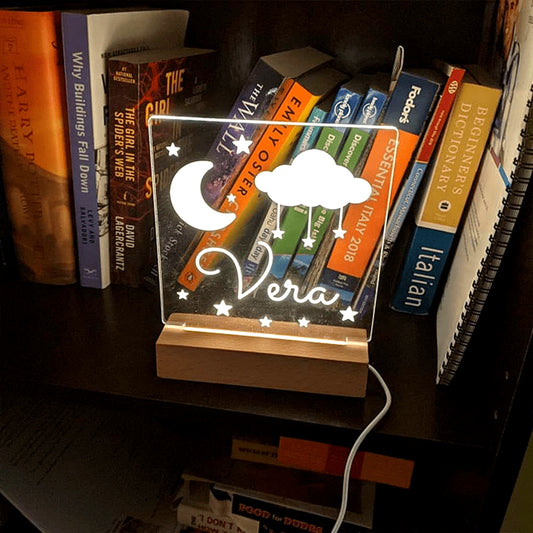 Make your space shine with our Custom LED Night Light featuring Moon and Stars design, personalized with your name. This decorative USB-powered desk light comes with easy button control, perfect for bedroom or game room ambiance. A thoughtful gift for