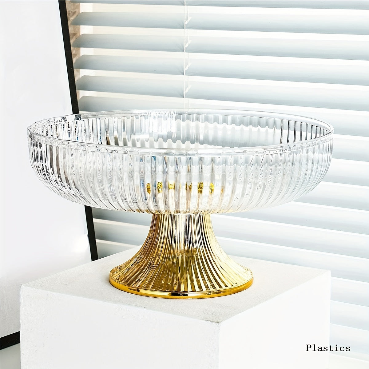 Beautiful acrylic fruit bowl with golden rim and luxurious texture. Perfect for snacks, candy, and fruits. Ideal for home decor, weddings, parties, and table centerpiece.