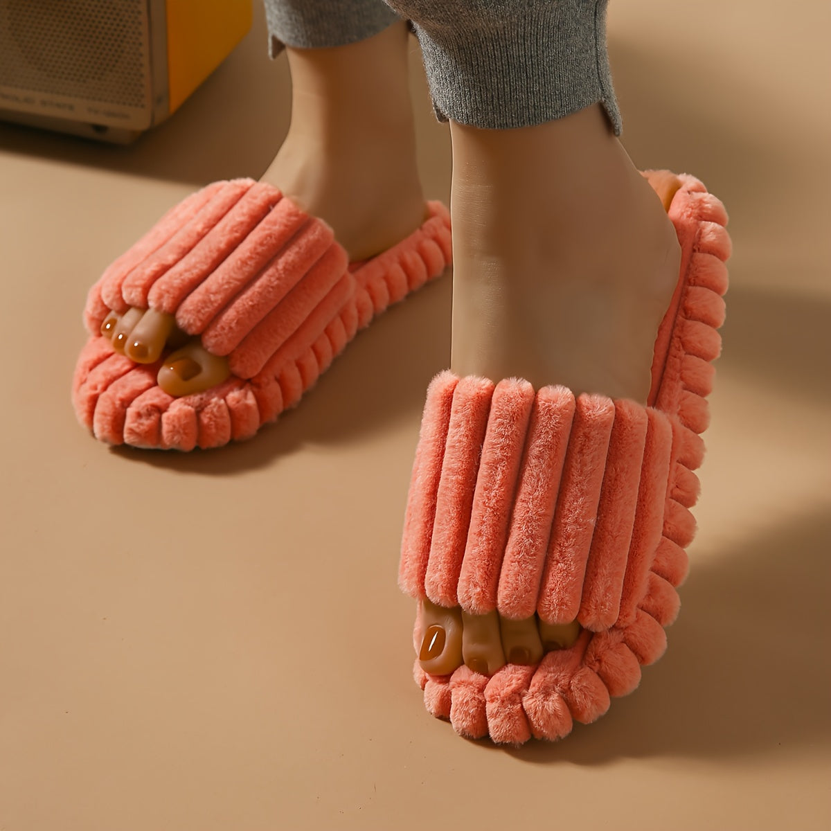 Soft-soled indoor slippers with stripes and open toes for spring and summer.