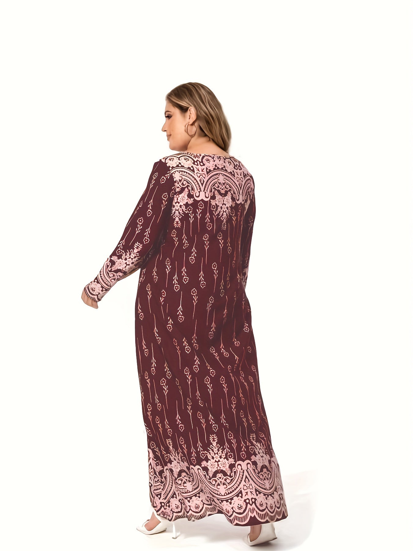 Plus size casual dress for Ramadan with floral print, long sleeves, and round neck.