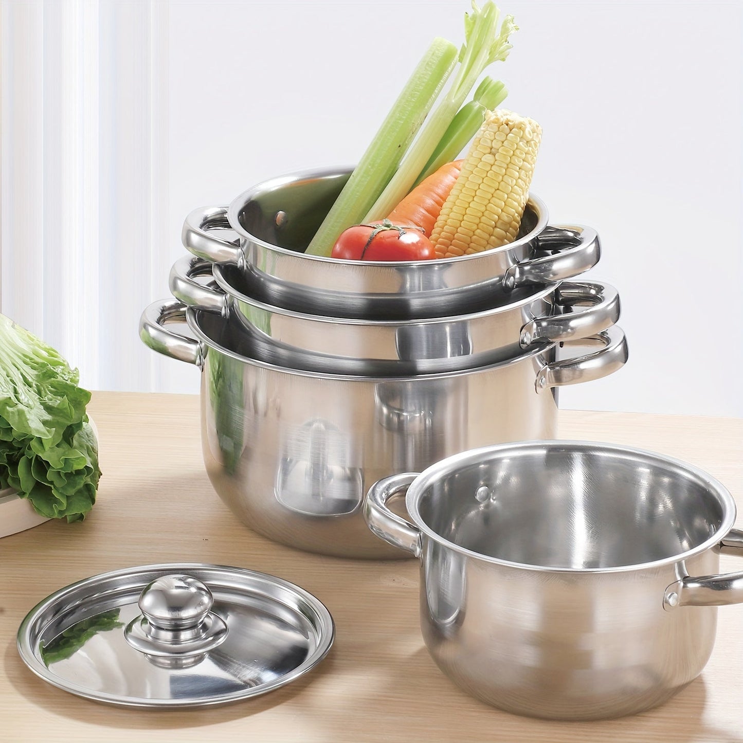 5 piece cookware set made of 410 stainless steel with a stainless steel cover, suitable for use on induction cookers.