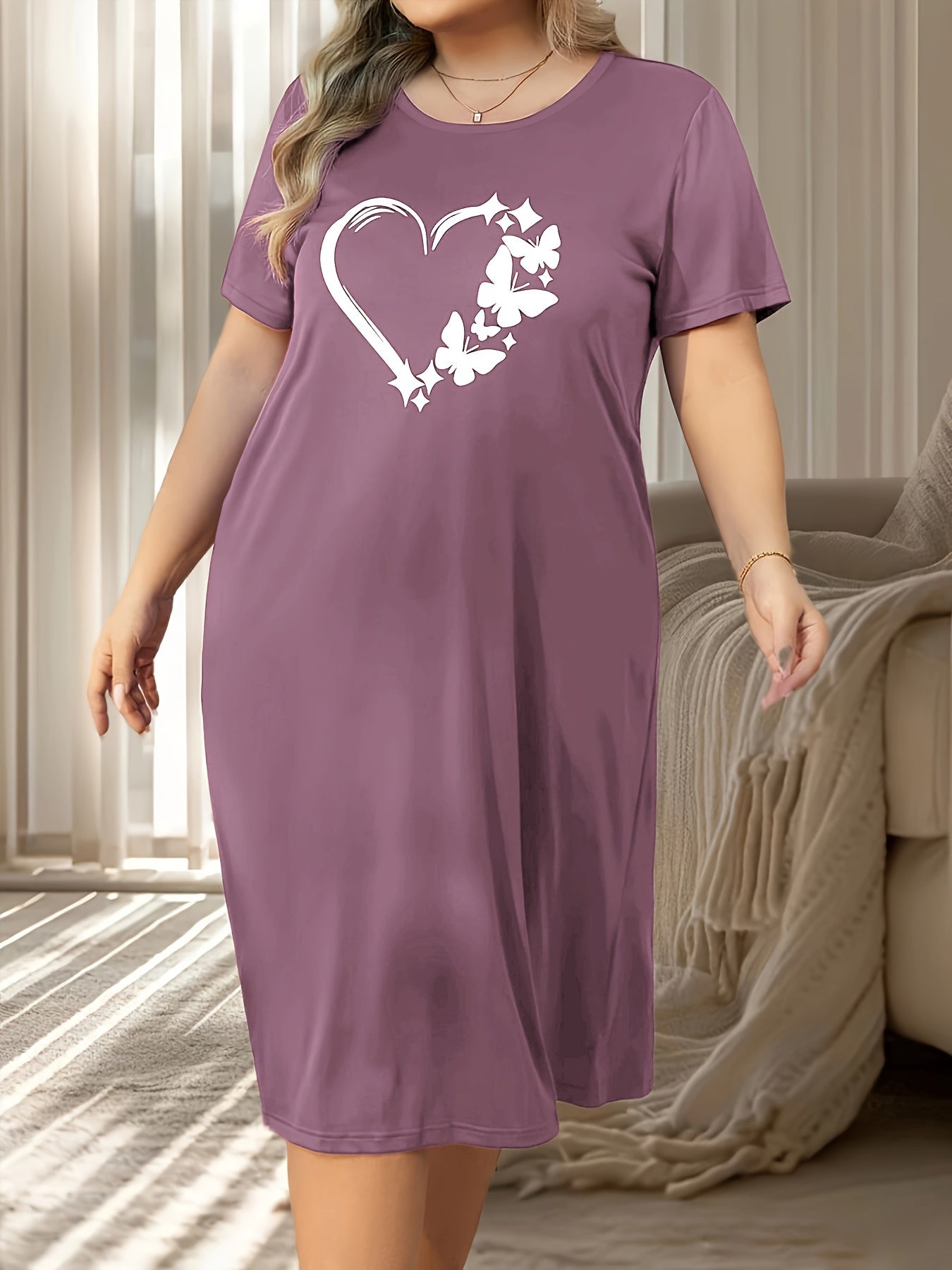 Plus size casual lounge dress with butterfly and heart print, short sleeves, crew neck.