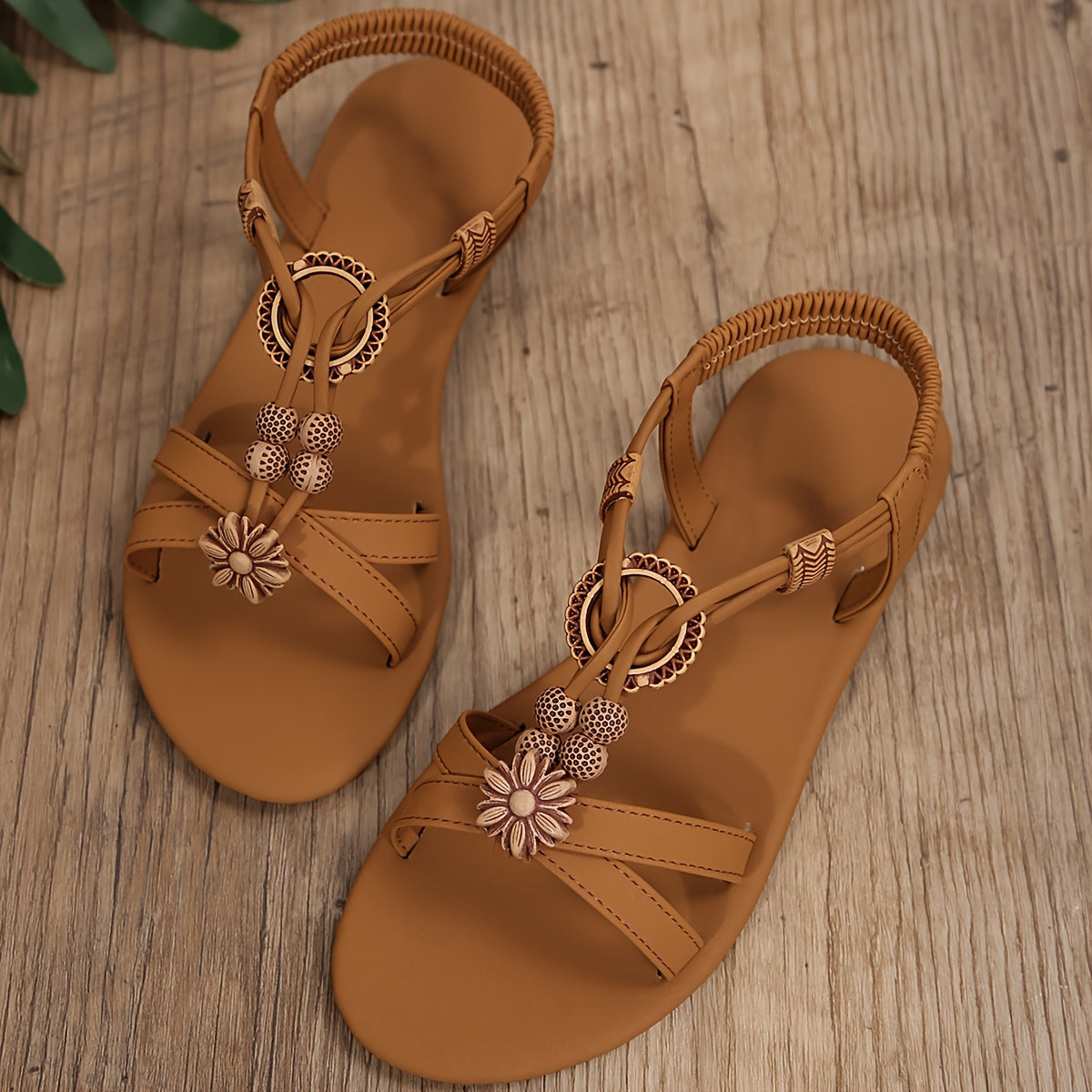 Women's breathable flat sandals with beaded detailing for summer beach holidays.