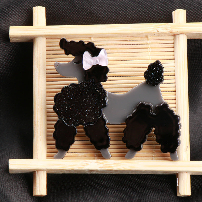 Add flair to your outfit with this Acrylic Black Poodle Brooch! This unique pin exudes charm and adds a touch of sophistication to any look. It makes a perfect accessory gift for friends during the holiday season.