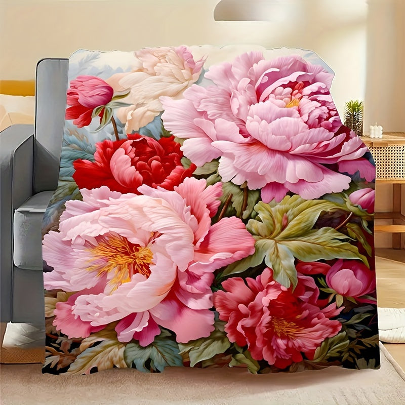 Soft and durable flannel throw blanket featuring a charming floral print. This versatile blanket is perfect for all seasons and can be used on the couch or bed. Easy to care for with machine washable material. Add a unique decorative touch to your