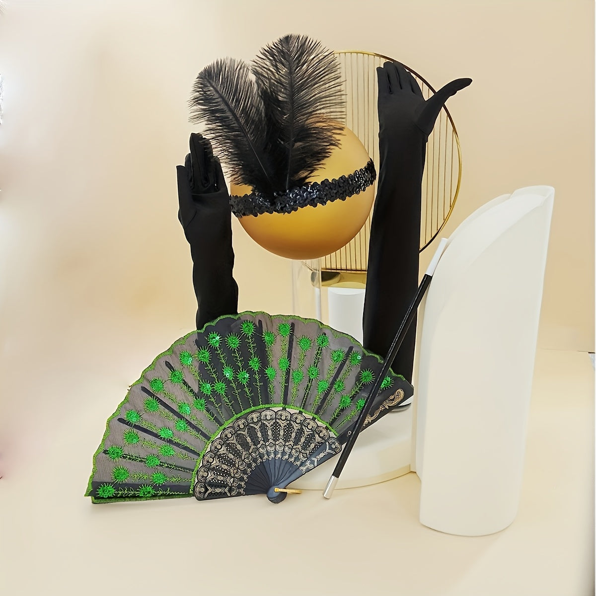 A collection of 1920s masquerade party accessories including gloves, faux feather hair clips, smoke tube fans, and other dress embellishments for women.