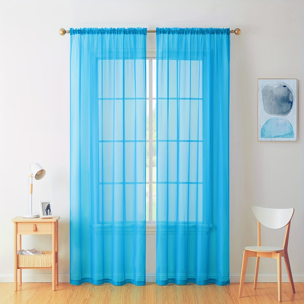 Enhance your decor with these elegant sheer voile curtain panels. Made of semi-transparent polyester, they feature a rod pocket design for easy hanging in your kitchen, bedroom, or living room. Create a romantic ambiance with these beautiful curtains.