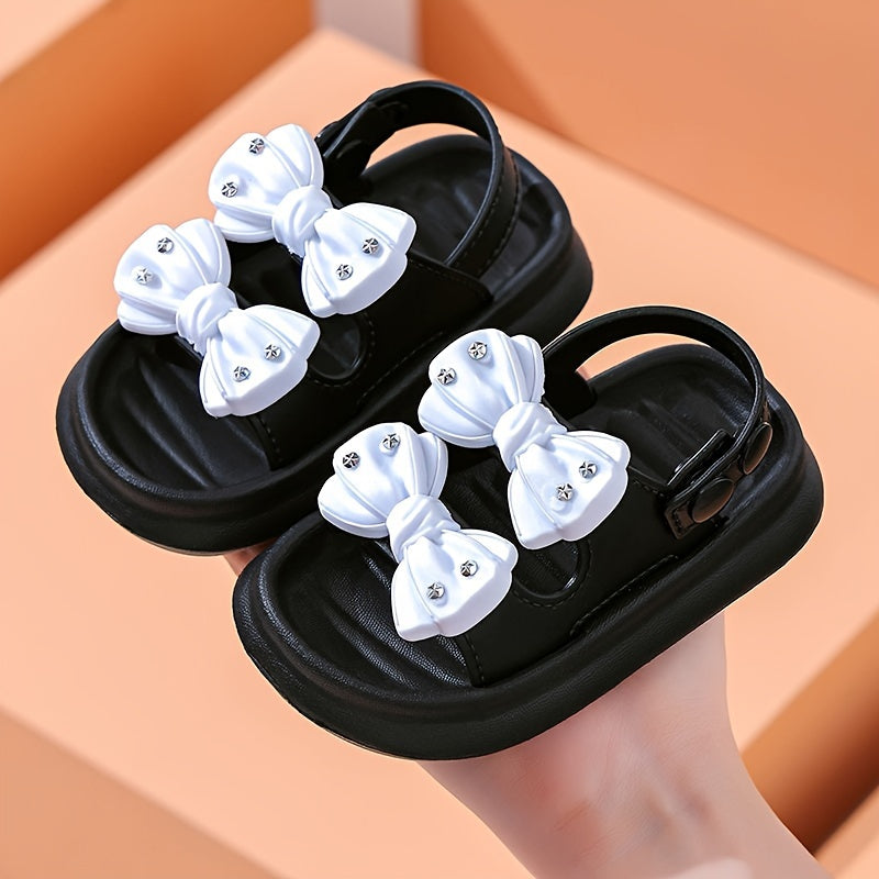 Stylish bowknot sandals for girls, perfect for indoor and outdoor wear.