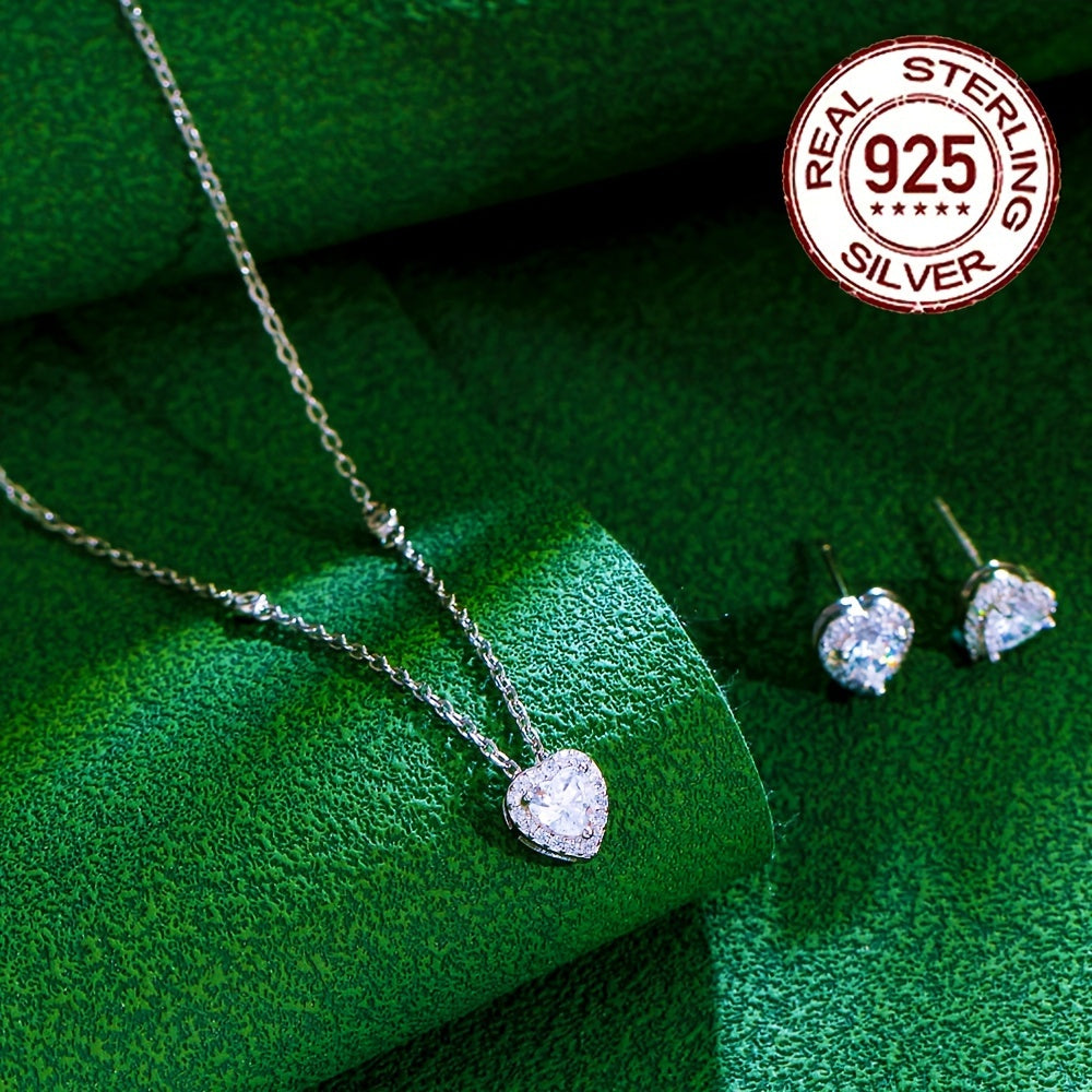 An Elegant Jewelry Set for Women, adorned with a Romantic Heart Design crafted from 925 Sterling Silver, weighing 5.7g/0.201oz. This stunning set features low allergenic properties and is embellished with sparkling White Cubic Zirconia in a Three-Prong