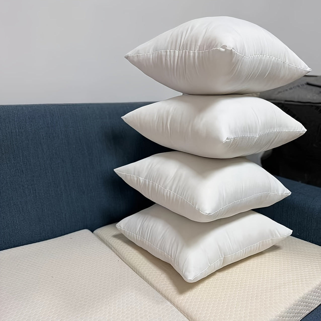 Set of four traditional white throw pillow inserts, featuring high resilience for a comfortable and stylish addition to your sofa, car, or bedroom décor