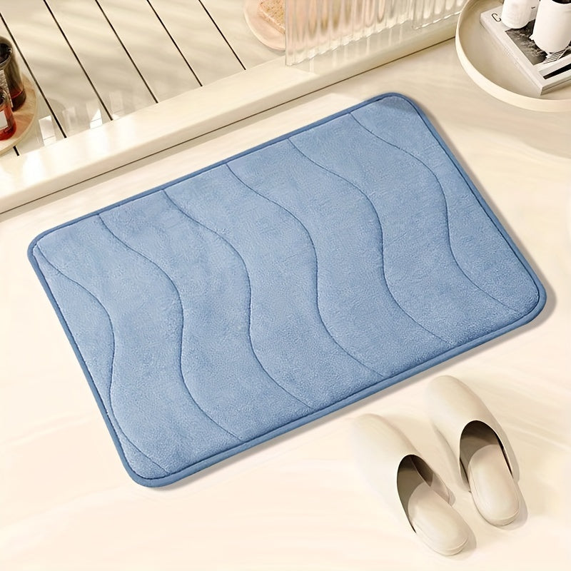 Soft and comfortable bath mat with high absorbency - ideal for bathrooms, showers, and bathtubs. Rectangular in shape, waterproof, and easy to clean.