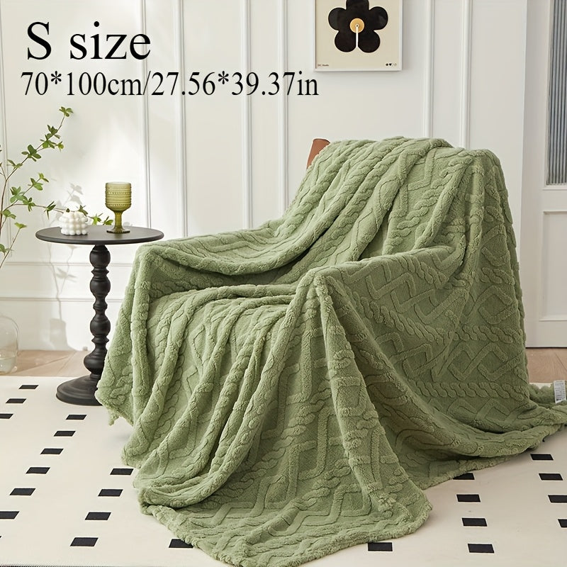 Cozy coral fleece blanket in chic diamond pattern. Ultra-soft, warm, and comfortable for bed, sofa, or travel. Available in beige, green, pink, and blue. Made of lightweight polyester. Hand wash only.