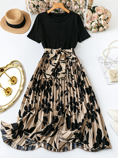 Plus size sleeveless floral print dress with ruffle detail in black and beige, perfect for spring/summer casual to semi-formal wear.