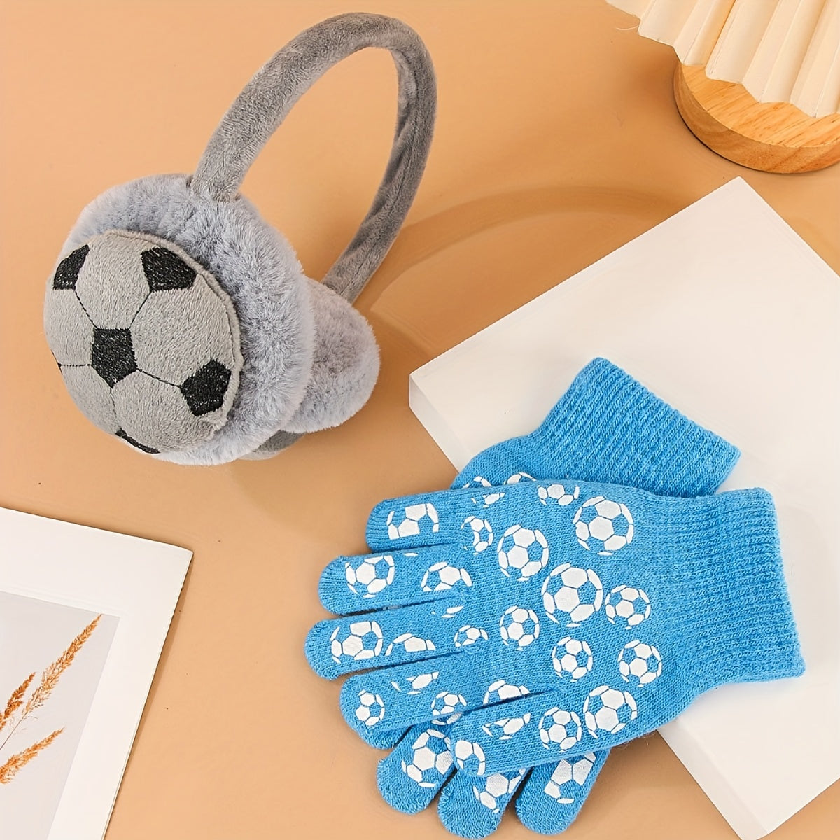 Stay warm and stylish with our Winter Sports Themed Acrylic Earmuffs and Gloves Set. These stretch fit ear warmers feature a knitting weave and are perfect for outdoor activities. Hand wash only. Suitable for both men and women, this unisex cold weather