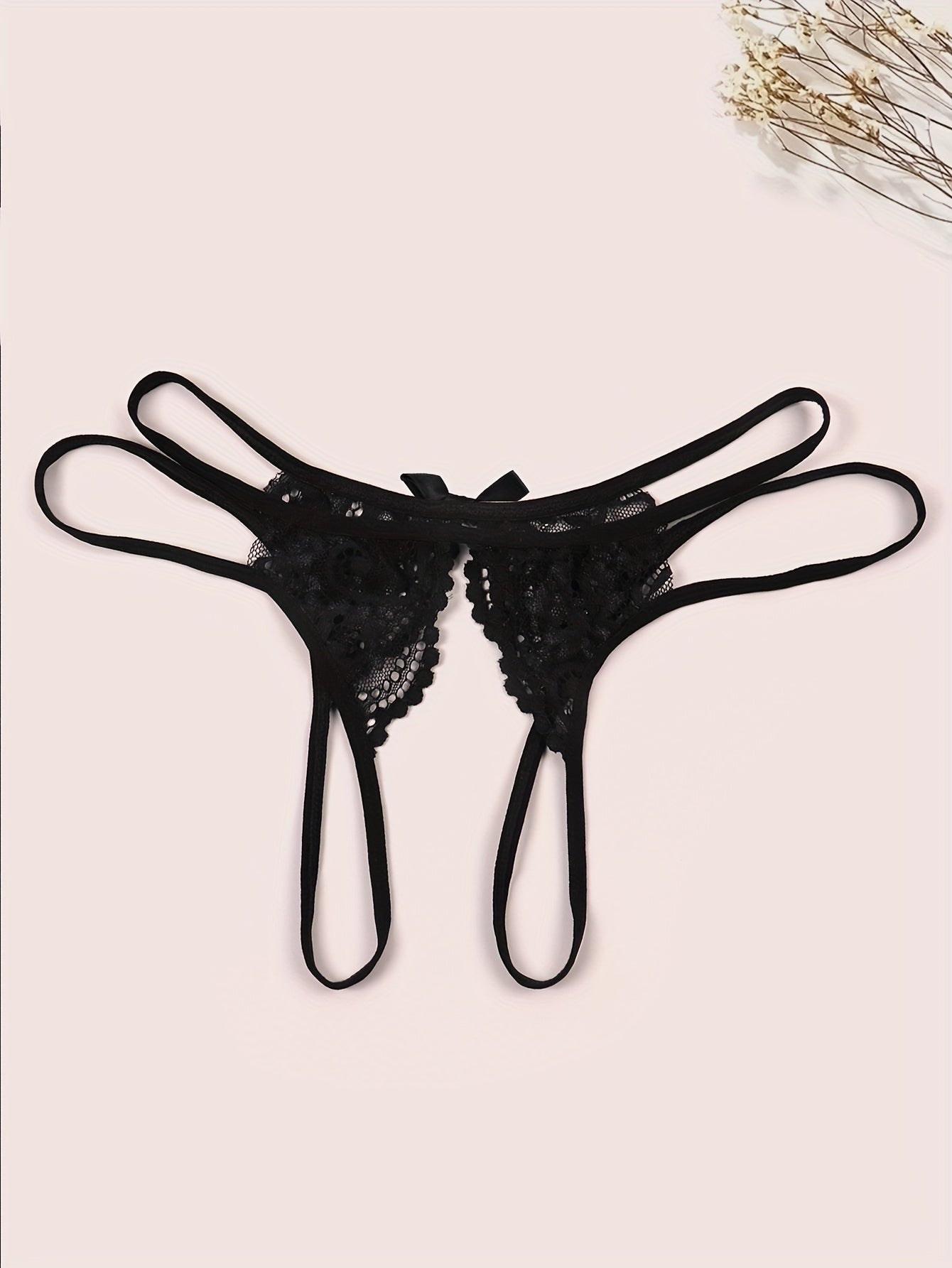 Seductive and comfortable velvet thong with open legs and bow detail for women