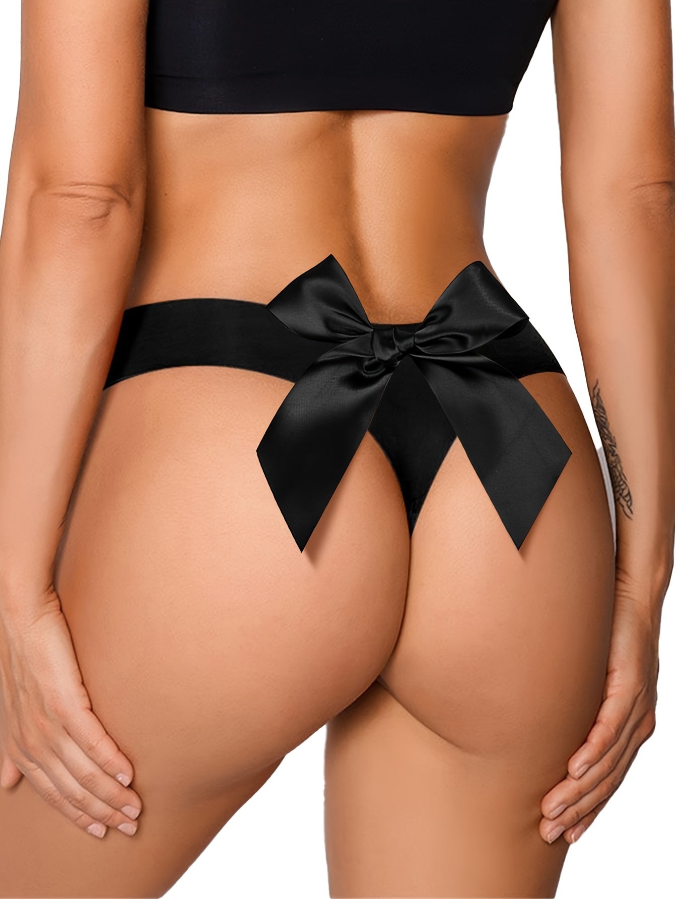 Solid black low waist thongs for women, sexy lingerie and underwear.