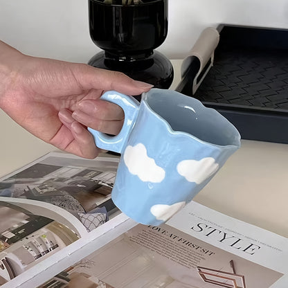 Cloud-shaped ceramic coffee mug with saucer - reusable, handwash only, ideal for breakfast & office use - great gift idea.