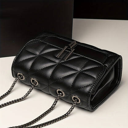 Stylish black quilted crossbody bag with adjustable strap, waterproof faux leather and embroidered detail. Perfect for women's fashion with a classic look and matching chain.