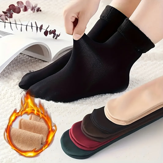 5 pairs of cozy mid-calf boot socks made of soft, breathable, elastic polyester for cold weather comfort.